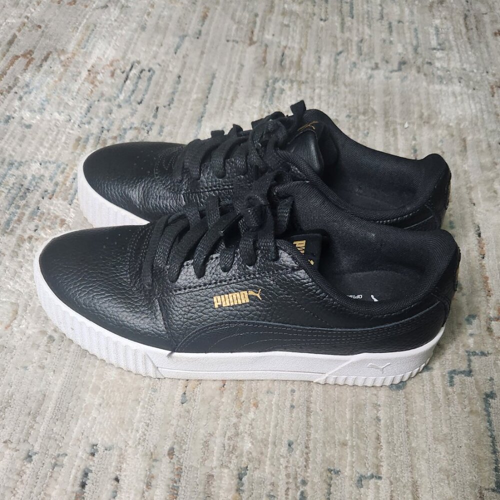 Puma Women's Carina Sneakers. Black with the Gold Puma Logo, size 8.5